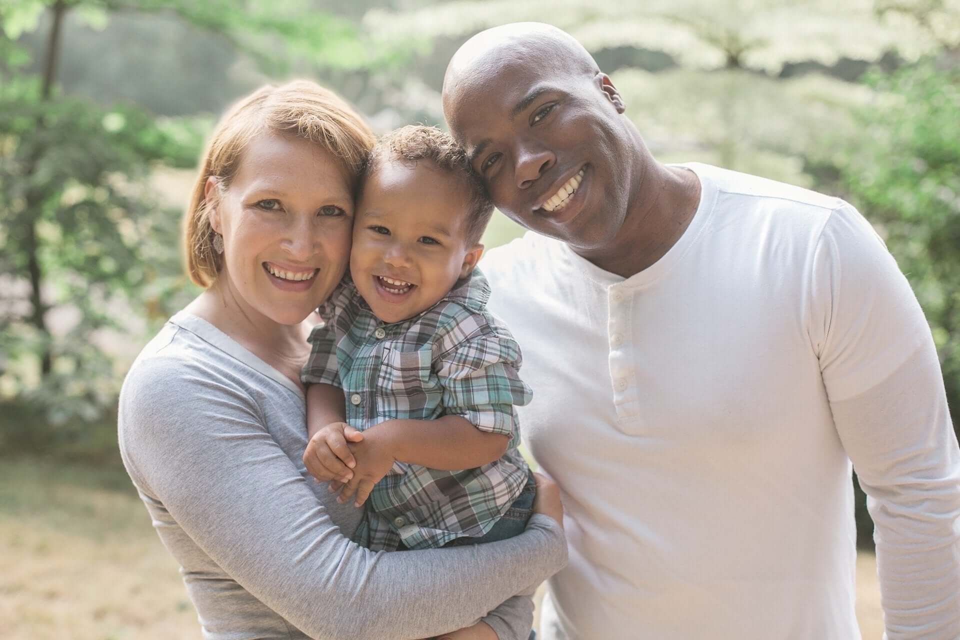 picture of multi racial family woman child and man